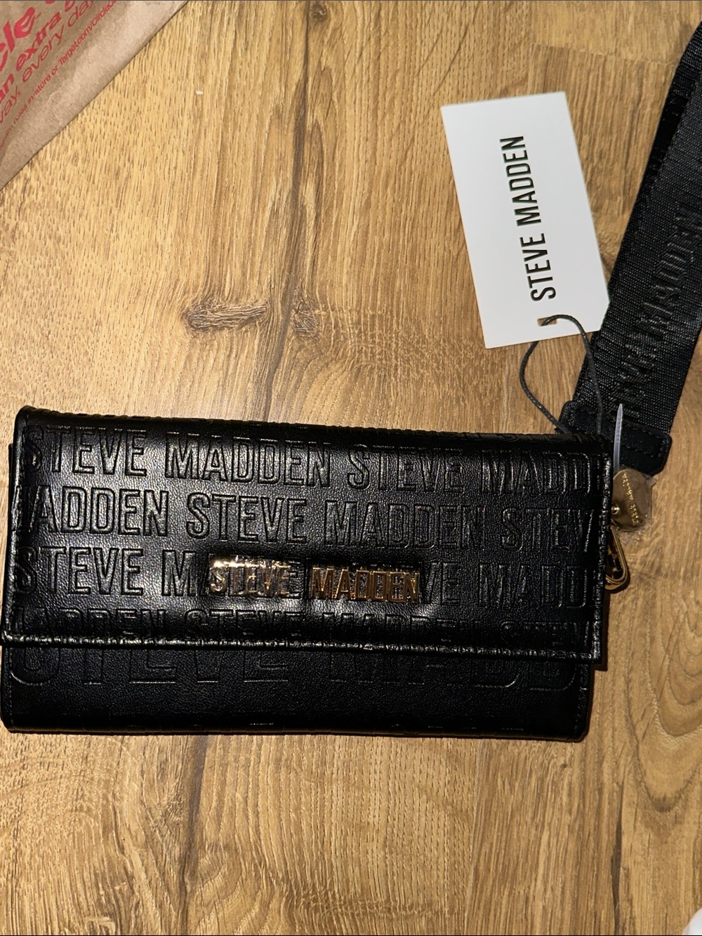 Steve Madden embossed logo print wristlet wallet
